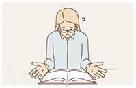 Frau sitzt vor Bibel und versteht nicht, was sie liest